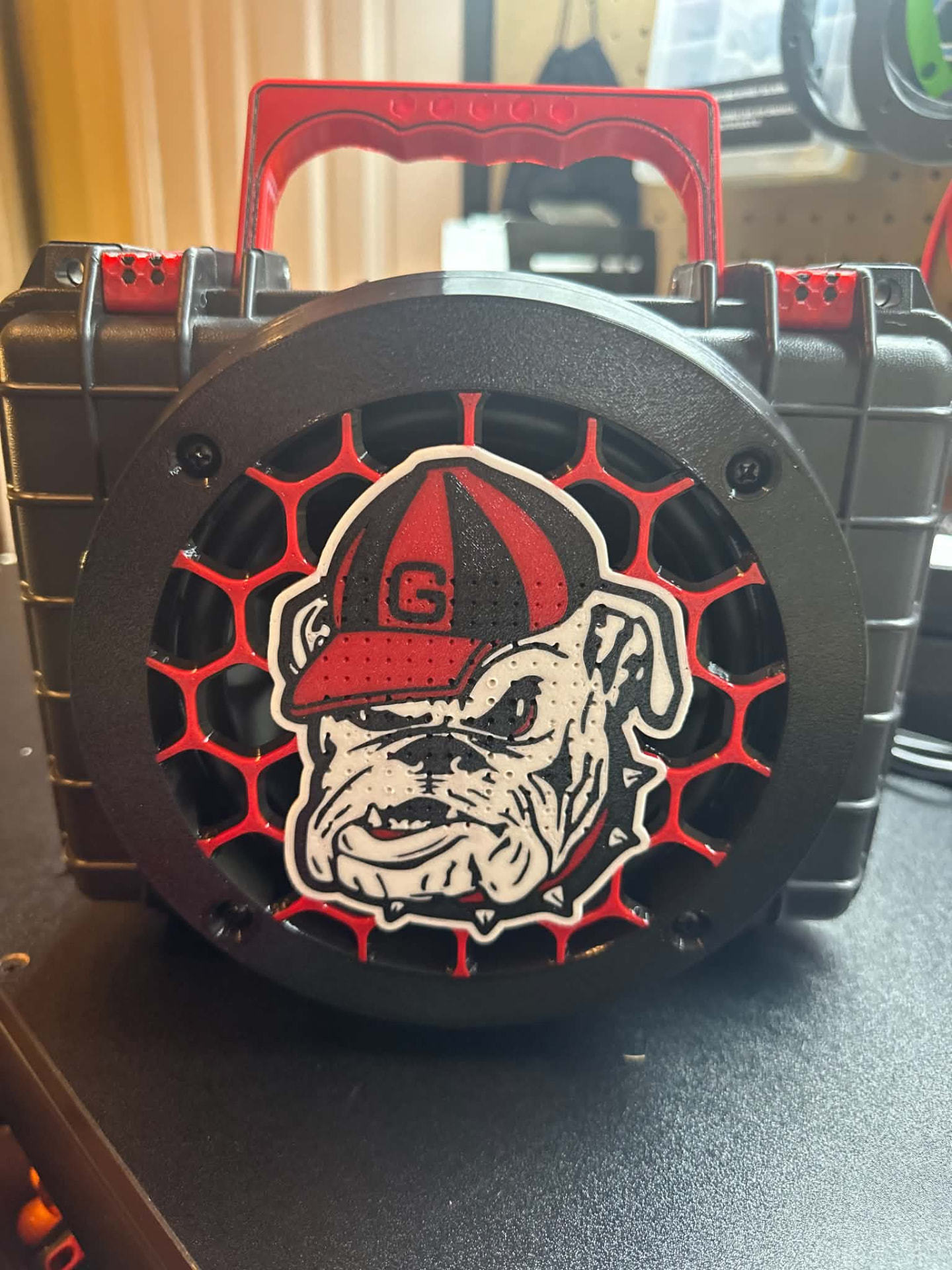 Black and red custom speaker with hand-painted bulldog grille